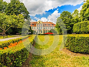 View on abbots palace and flowers in gdansk oliva park.