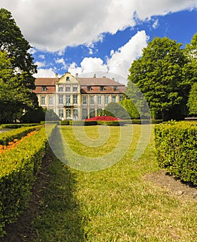 View on abbots palace and flowers in gdansk oliva park.