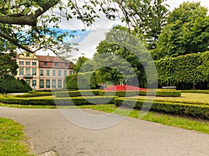 View on abbots palace and flowers in gdansk oliva park.