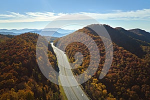 View from above of empty deserted I-40 freeway route in North Carolina leading to Asheville thru Appalachian mountains