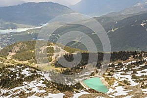 View from above on the hills and mountains between two lakes