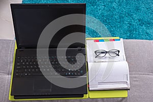 View from above of laptop-table with laptop