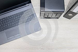 view from above for office workplace with notebook and nas backup server on a wooden background. photo