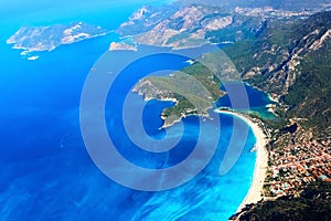 View from above with a paraglider on the bay of the blue lagoon. Turkey. Oludeniz photo