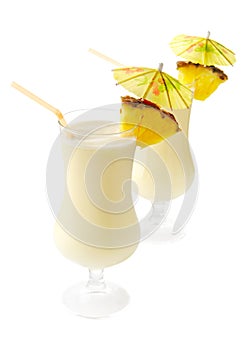 View from above of Pina colada with pineapple and cherry isolated on white