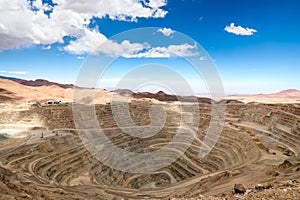 View from above of the pit of an open-pit copper mine