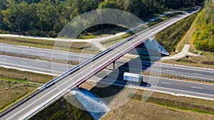 View from above on riding truck on highway under bridge