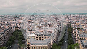 View from above, on the roofs of the old district of Paris, by France Slow Motion. Cityscape cars on the road. Shot from