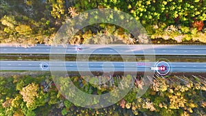 View from above of semi truck on autopilot with malfunction self-driving system causing danger on busy american highway