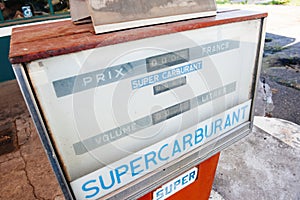 View from above of Super Carburant prix au litre translated Super Fuel price per