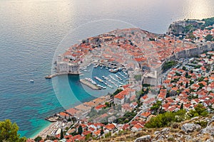 View from above to old town Dubrovnik, the harbour and beach