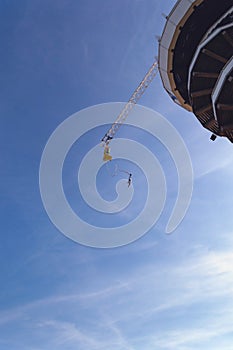 View from above on unidentified man doing bungee jump