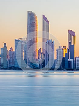 View of the Abu Dhabi Skyline from the Corniche during Sunrise