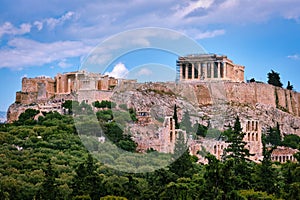 View of Acropolis hill and theater of Odeon in Athens, Greece from the hill of Philoppapos or Muses in summer daylight