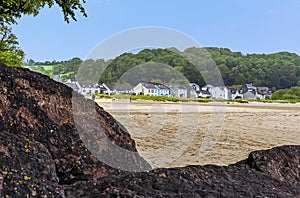 A view across the beach back towards the village of Llansteffan, Wales