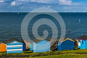 A view across the beach huts at Tankerton out into the Thames Estuary