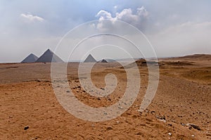 View across the desert to the Pyramids of Giza.