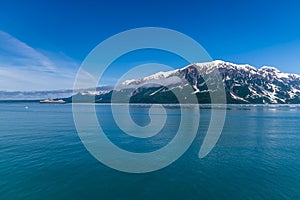 A view across Disenchartment Bay towards the bay side and a cruise ship in Alaska