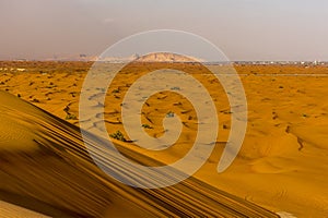 A view across the dunes of the red desert at Hatta near Dubai, UAE