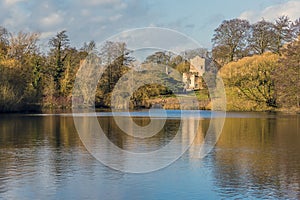 A view across a lake at Newstead Park, Nottinghamshire, UK