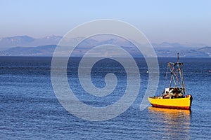 View across Morecambe Bay to Lake District hills