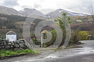 A view across one of the many snow topped hills and valleys of the Mourne Mountains in County down in Northern Ireland on a dull m