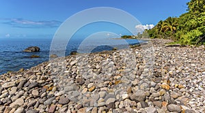A view across a pebbled beach in St Kitts