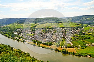 View across river Moselle to Puenderich village - Mosel wine region in Germany