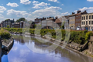 A view across the River Nene towards the North Brink in Wisbech, Cambridgeshire