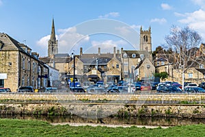 A view across the River Welland towards All Saints and Saint Johns Churches in Stamford, Lincolnshire, UK photo