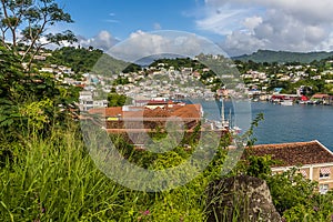A view across the roof tops towards the inner harbour in St George in Grenada