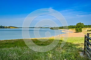 View across Rutland Water a large reservoir in Leicestershire.