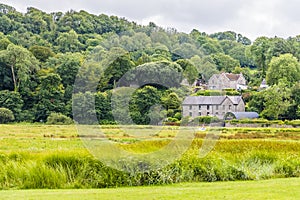 A view across salt marshes towards Laugharne, Pembrokeshire, South Wales