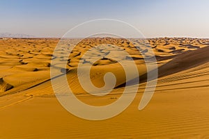 A view across the Seif dunes in the Arabian red desert at Hatta near Dubai, UAE