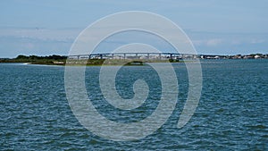 View Across Water of Francis and Mary Usina Bridge photo