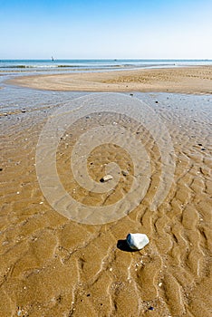 View of the Adriatic Sea from the sandy beach in Pesaro, Italy