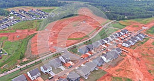 View from an aerial point of view of an unfinished subdivision housing construction site