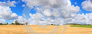 View of agricultural fields under sky with clouds, in the historical province Gascony, the region of Occitanie of southwestern Fra