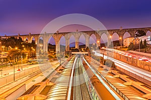 View of The Aguas Livres Aqueduct and Campolide train station, Lisbon, Portugal