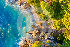 View from the air on the beach. Aerial view. Rest on the beach. Sea relaxation and travel. The forest near the sea.