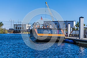 A view of an airboat beside a jetty in the Everglades, Florida