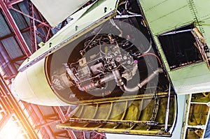 View of aircraft tail and auxiliary power unit.