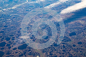 View from airplane on Earth surface.