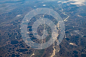 View from airplane on Earth surface.