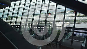 View on airport hall from moving escalator, vacation and travel, tourism