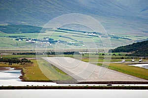 View of airport runway from sea, Akureyri - Iceland