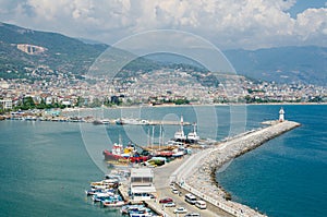 View of Alanya harbor before sunset. Beautiful sea landscape of Alanya Castle in Antalya district, Turkey.