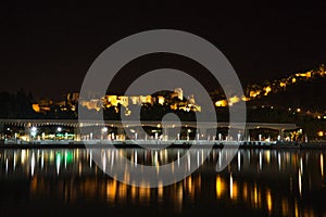 View of Alcazaba from harbour, Malaga, spain, Euope at night wit photo