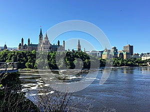 A view from the Alexandra Bridge on a beautiful sunny summer day of Parliament hill, the Supreme Court of Canada