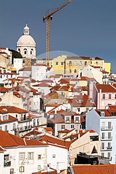 View of Alfama neighborhood and the National Pantheon in Lisbon from Miradouro de Santa Luzia viewpoint, Portug